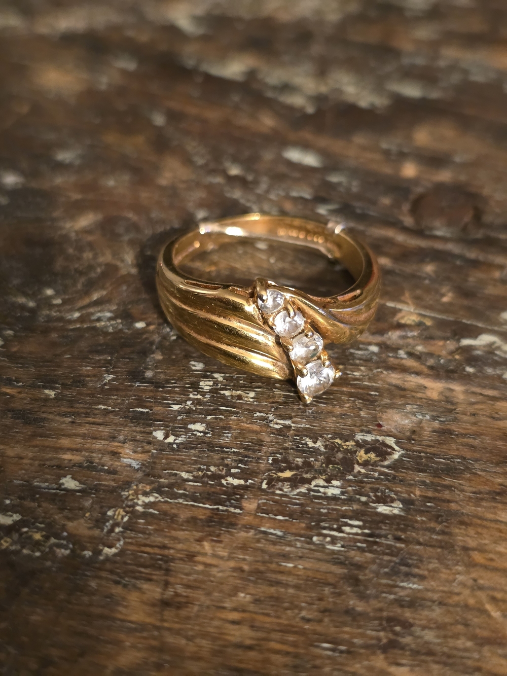 Gold-Plated Women’s Size 9 Ring with CZ Three Clear Stones and Curved Band
